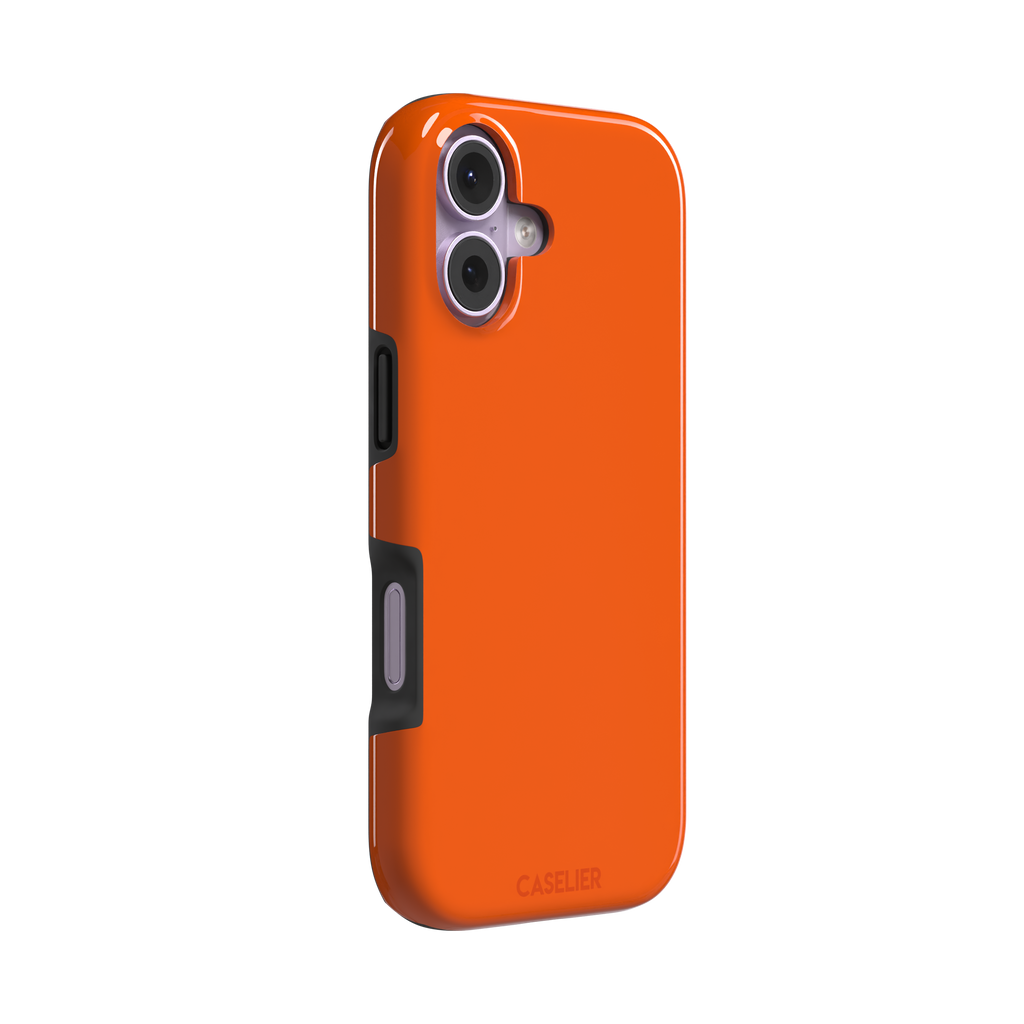 Bold vivid orange solid-color phone case, slightly zoomed front view on iPhone, phone case by Caselier — tough case, left view