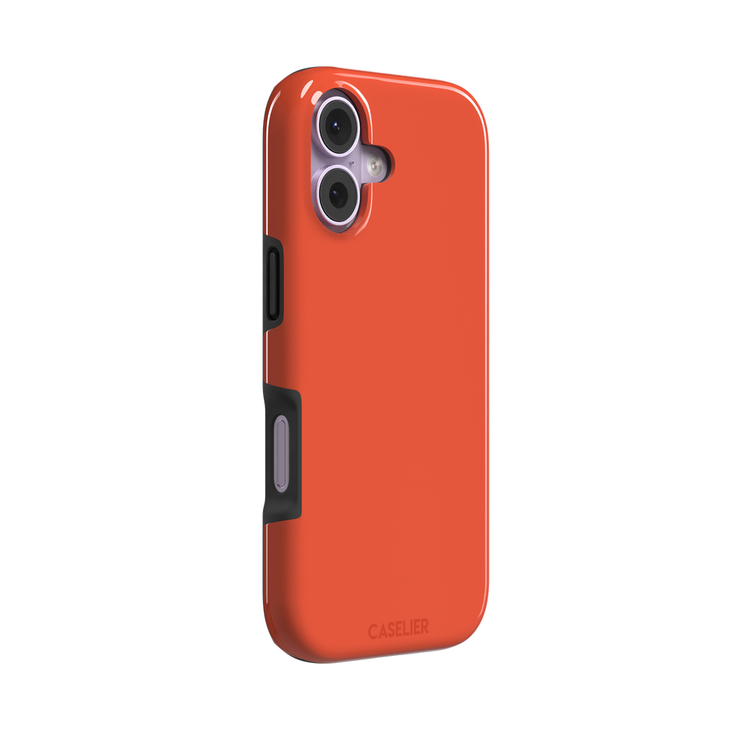 Rich tomato-red orange solid-color phone case variant on iPhone, phone case by Caselier — tough case, left view