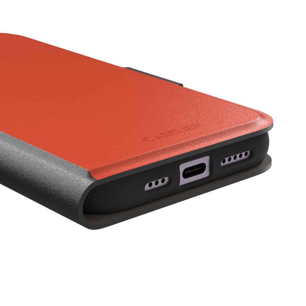 Rich tomato-red orange solid-color phone case variant on iPhone, phone case by Caselier — wallet case, charging port detail