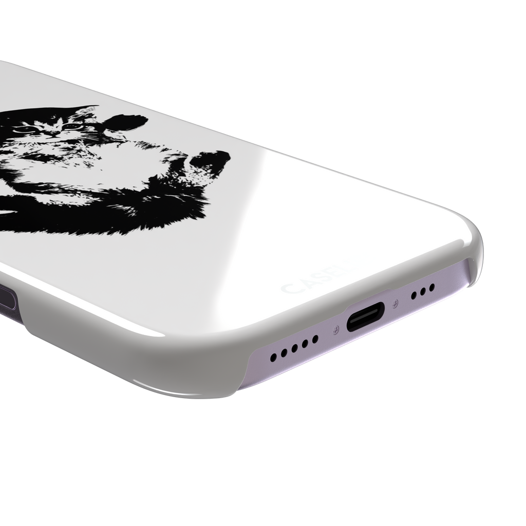 White phone case with a bold black-and-white ink-style illustration of a fluffy kitten lying on its back with paws raised, phone case by Caselier — snap case, charging port detail