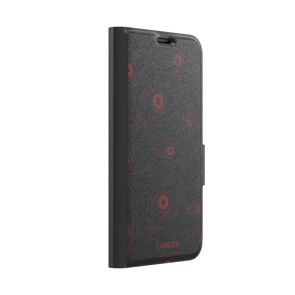 Paranoia phone case in black with all-over deep red hand-drawn staring eyes and sharp angular lashes, color variant, phone case by Caselier — wallet case, left view