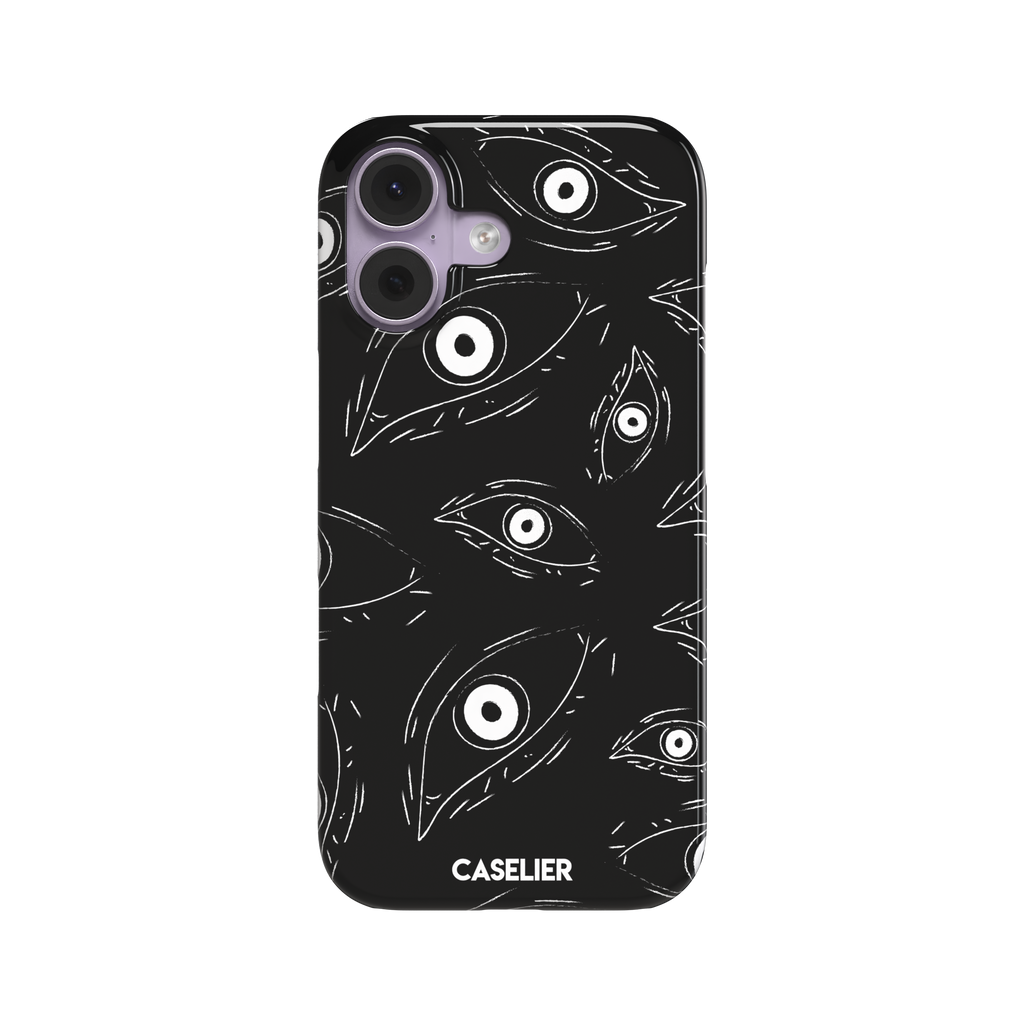 Paranoia phone case in black with all-over white hand-drawn staring eyes and sharp angular lashes, phone case by Caselier — snap case, front view