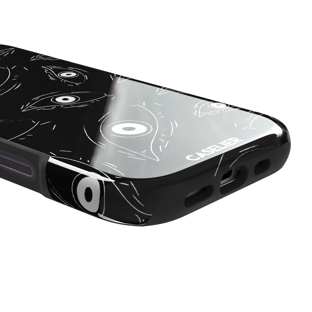 Paranoia phone case in black with all-over white hand-drawn staring eyes and sharp angular lashes, phone case by Caselier — tough case, charging port detail