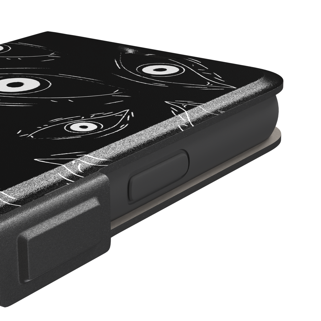 Paranoia phone case in black with all-over white hand-drawn staring eyes and sharp angular lashes, phone case by Caselier — wallet case, volume buttons detail