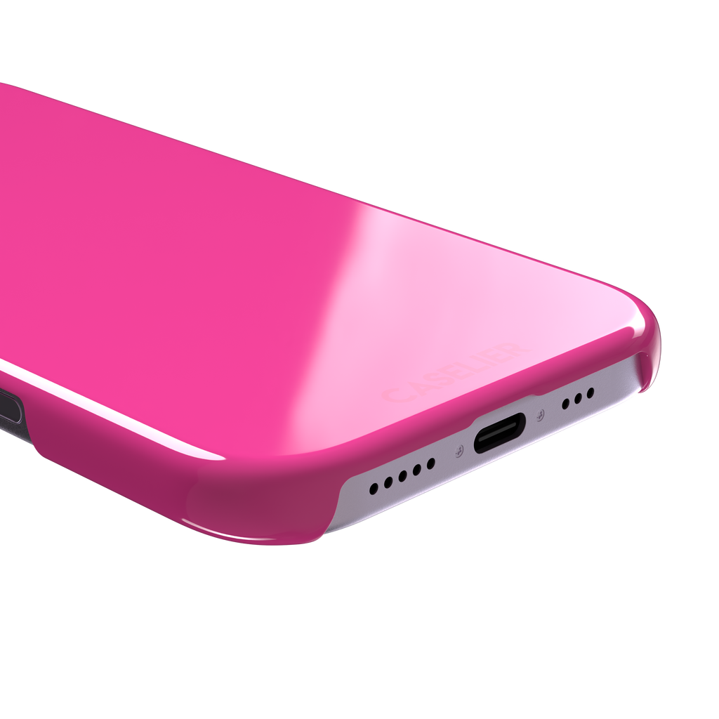 Solid hot pink matte phone case, vivid magenta-pink shade variant, phone case by Caselier — snap case, charging port detail