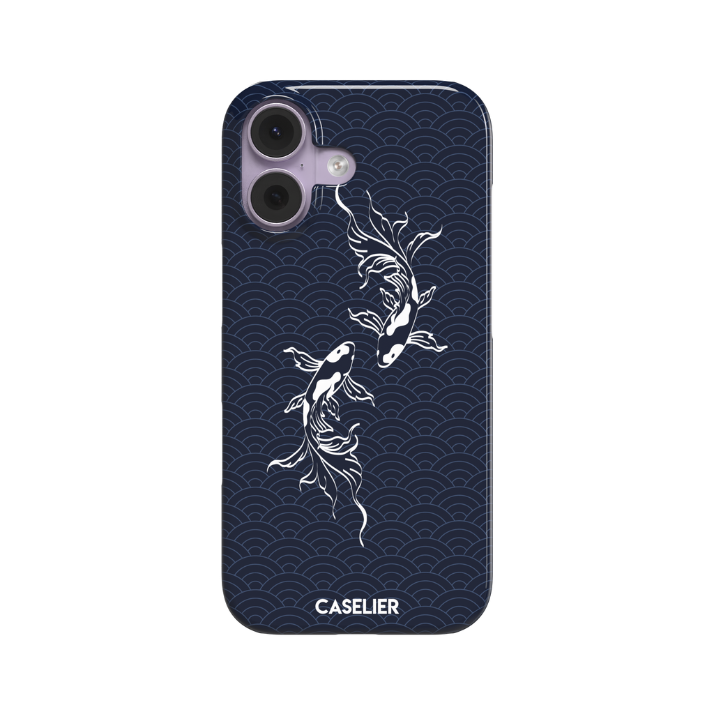 Playful Fishies phone case featuring two white koi fish in line-art style on a deep navy Japanese seigaiha wave pattern, phone case by Caselier — snap case, front view