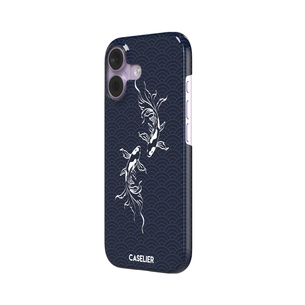 Playful Fishies phone case featuring two white koi fish in line-art style on a deep navy Japanese seigaiha wave pattern, phone case by Caselier — snap case, right view