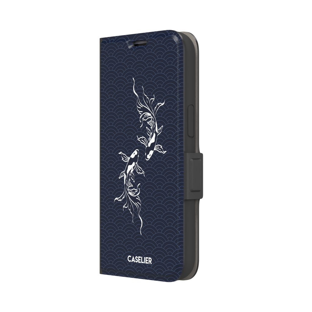 Playful Fishies phone case featuring two white koi fish in line-art style on a deep navy Japanese seigaiha wave pattern, phone case by Caselier — wallet case, right view