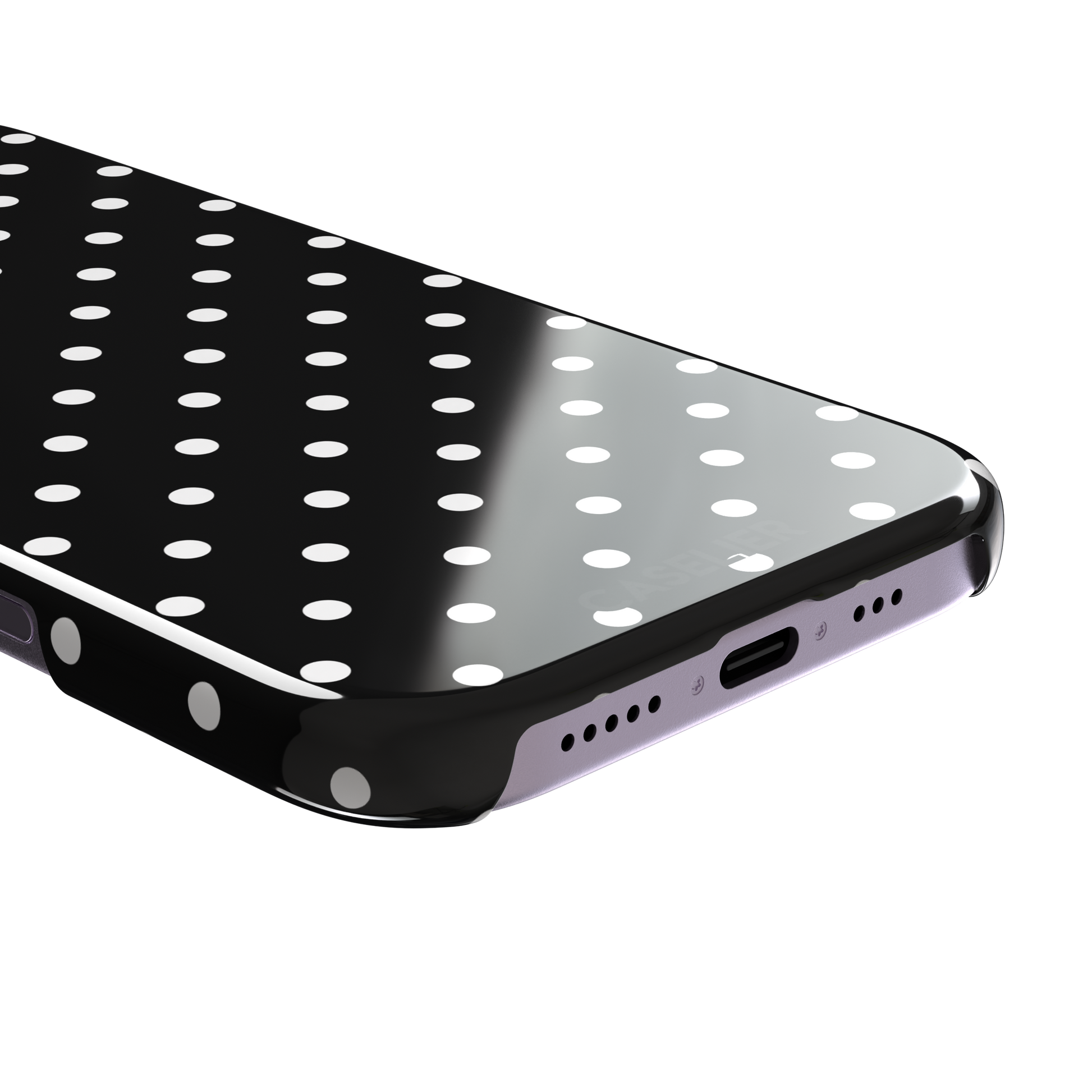 Polka dot phone case in black with crisp white spots in a bold high-contrast all-over pattern, phone case by Caselier — snap case, charging port detail