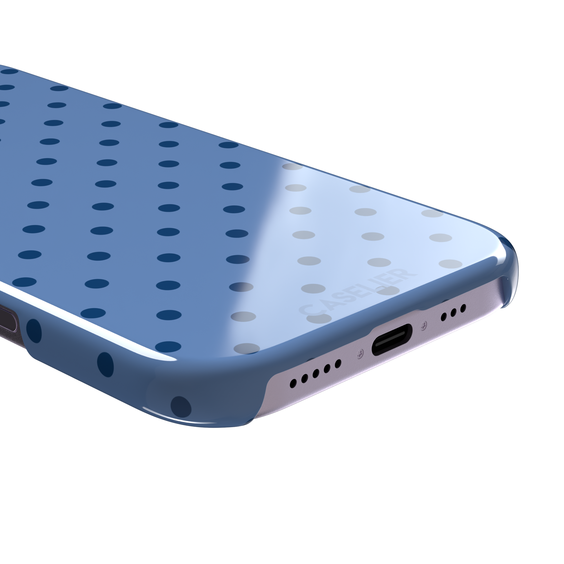 Polka dot phone case in cornflower blue with darker navy spots in a uniform all-over pattern, phone case by Caselier — snap case, charging port detail