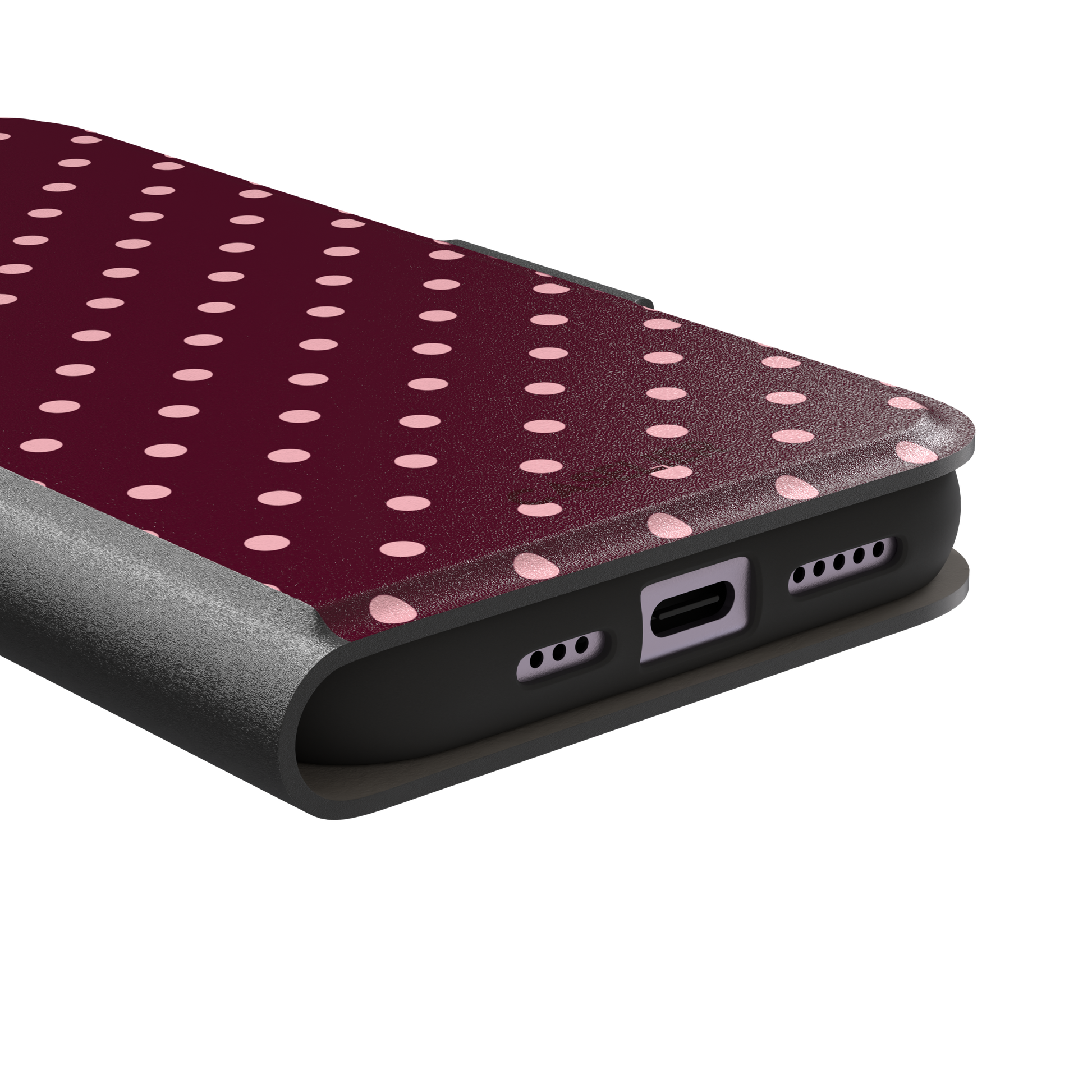 Polka dot phone case in deep burgundy with blush pink spots arranged in a classic evenly spaced grid, phone case by Caselier — wallet case, charging port detail