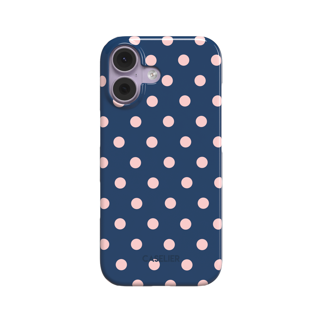 Polka dot phone case with deep navy blue background and soft blush pink dots in a classic two-tone pattern, phone case by Caselier - snap case, front view | Caselier