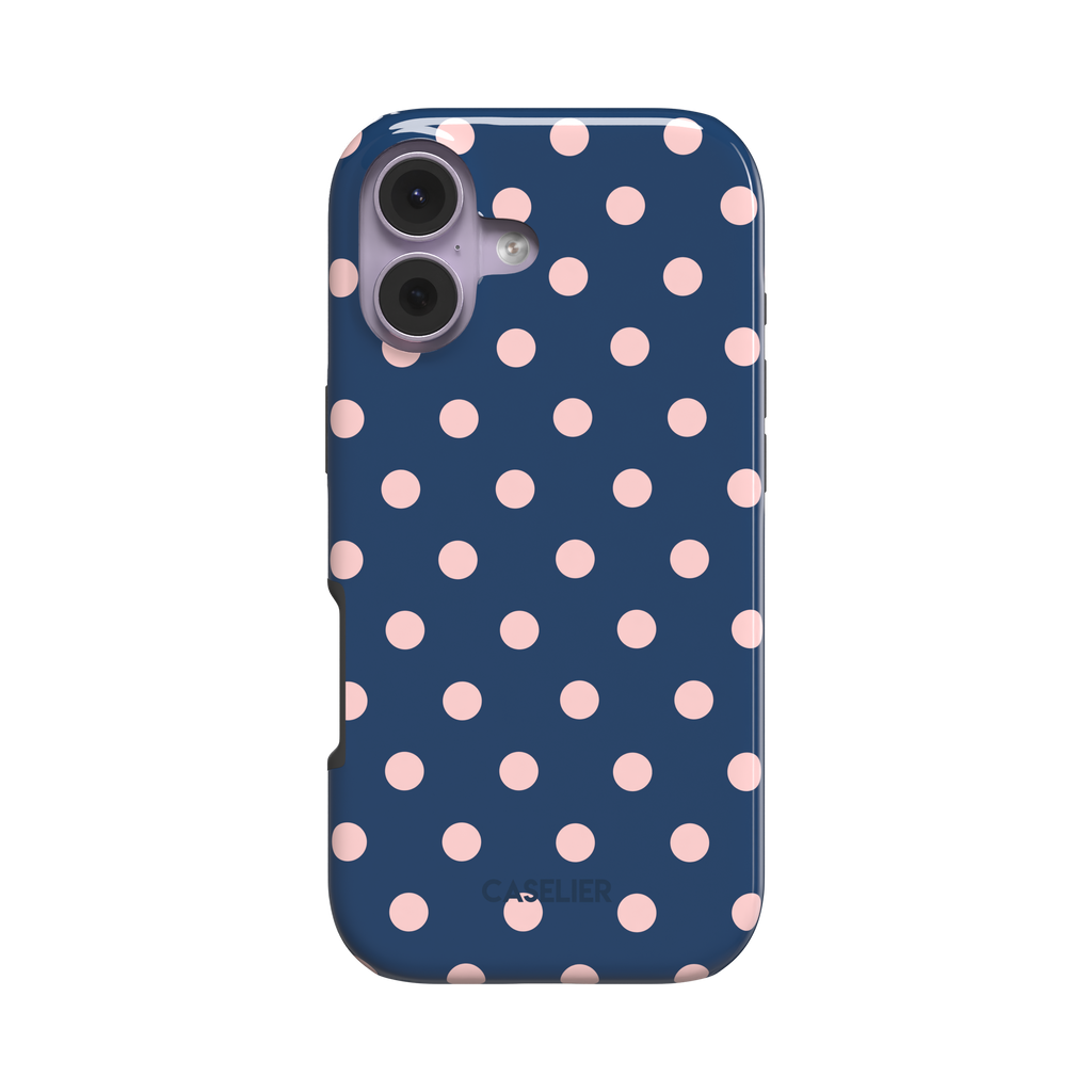 Polka dot phone case with deep navy blue background and soft blush pink dots in a classic two-tone pattern, phone case by Caselier - tough case, front view | Caselier