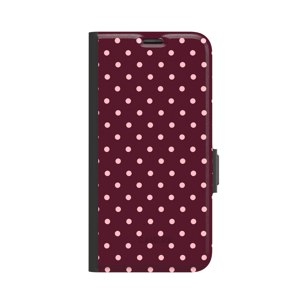 Polka Freckles phone case in deep burgundy with an all-over soft pink polka dot pattern, glossy finish, phone case by Caselier - wallet case, front view | Caselier