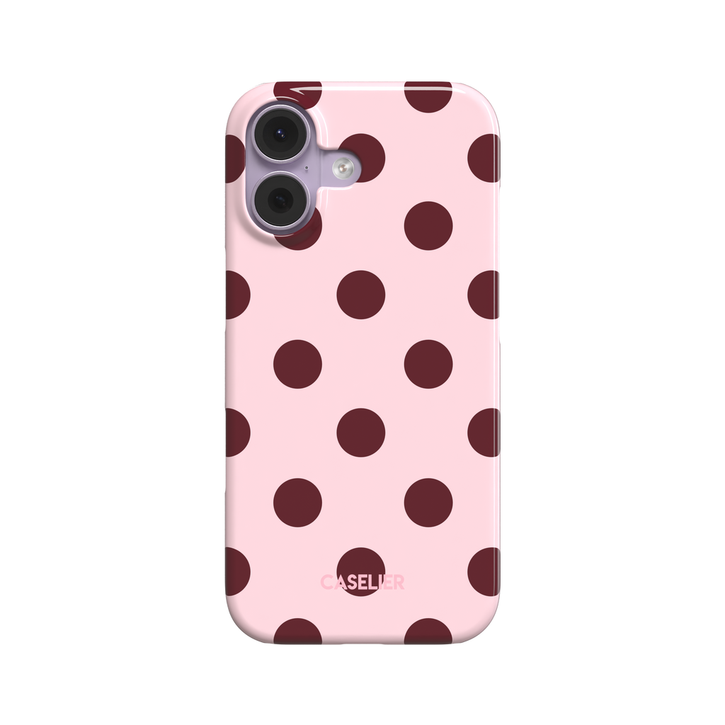 Polka Spots phone case in blush pink with deep burgundy polka dots, slim snap case style, front-facing product shot on white background, phone case by Caselier - snap case, front view | Caselier