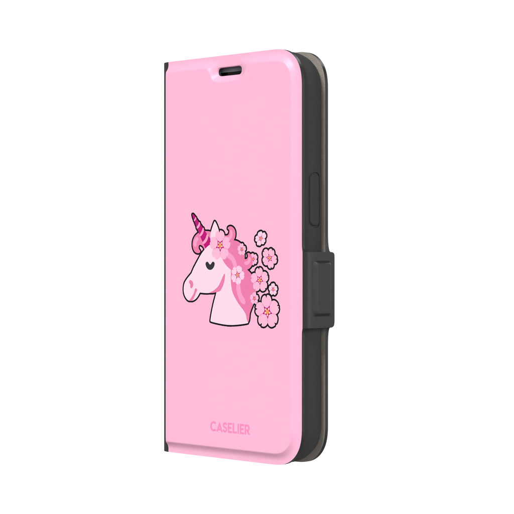 Pink phone case featuring a cute cartoon unicorn with a striped horn and a cherry blossom-filled mane on a bubblegum pink background, phone case by Caselier — wallet case, right view
