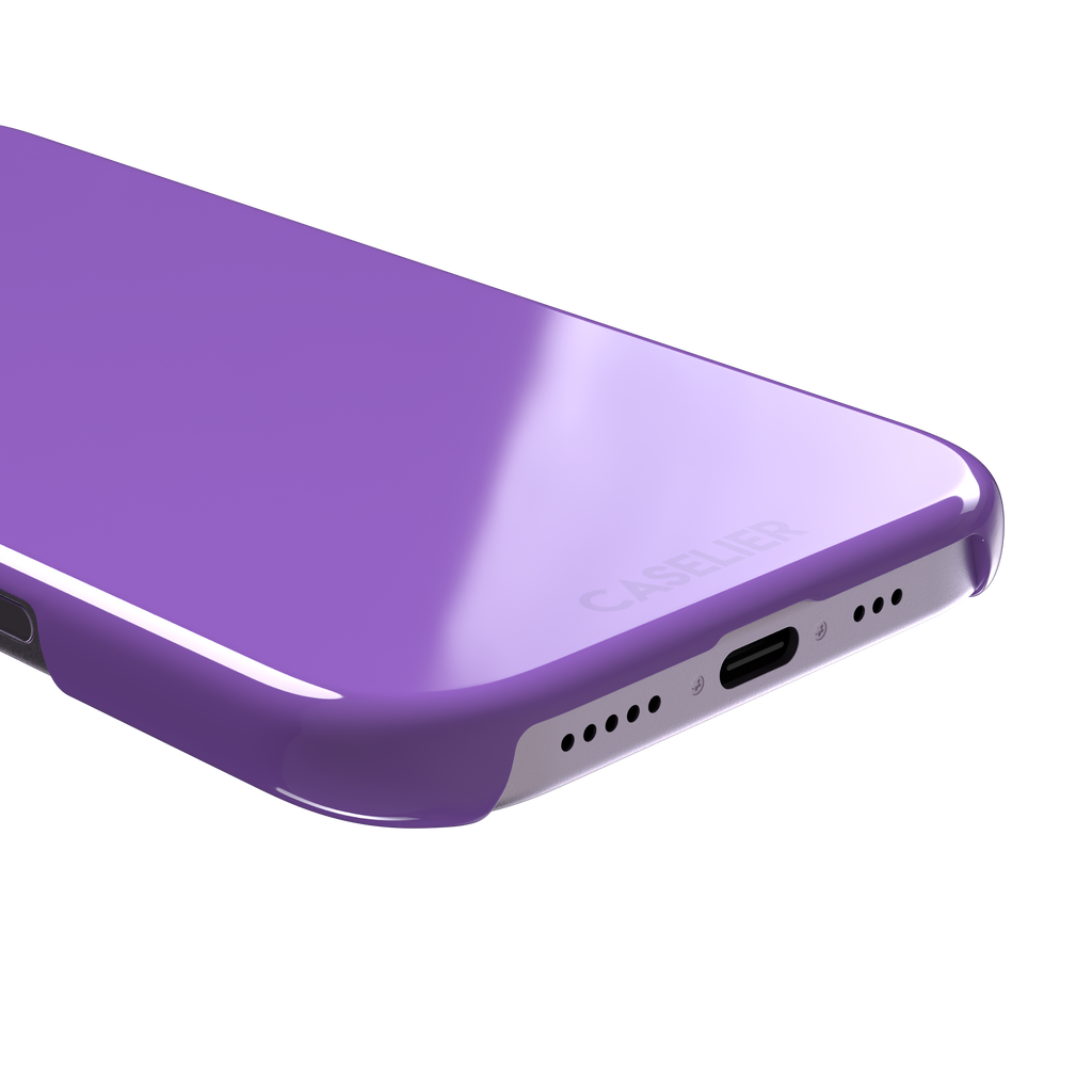 Solid medium violet phone case in a balanced mid-tone purple, phone case by Caselier — snap case, charging port detail