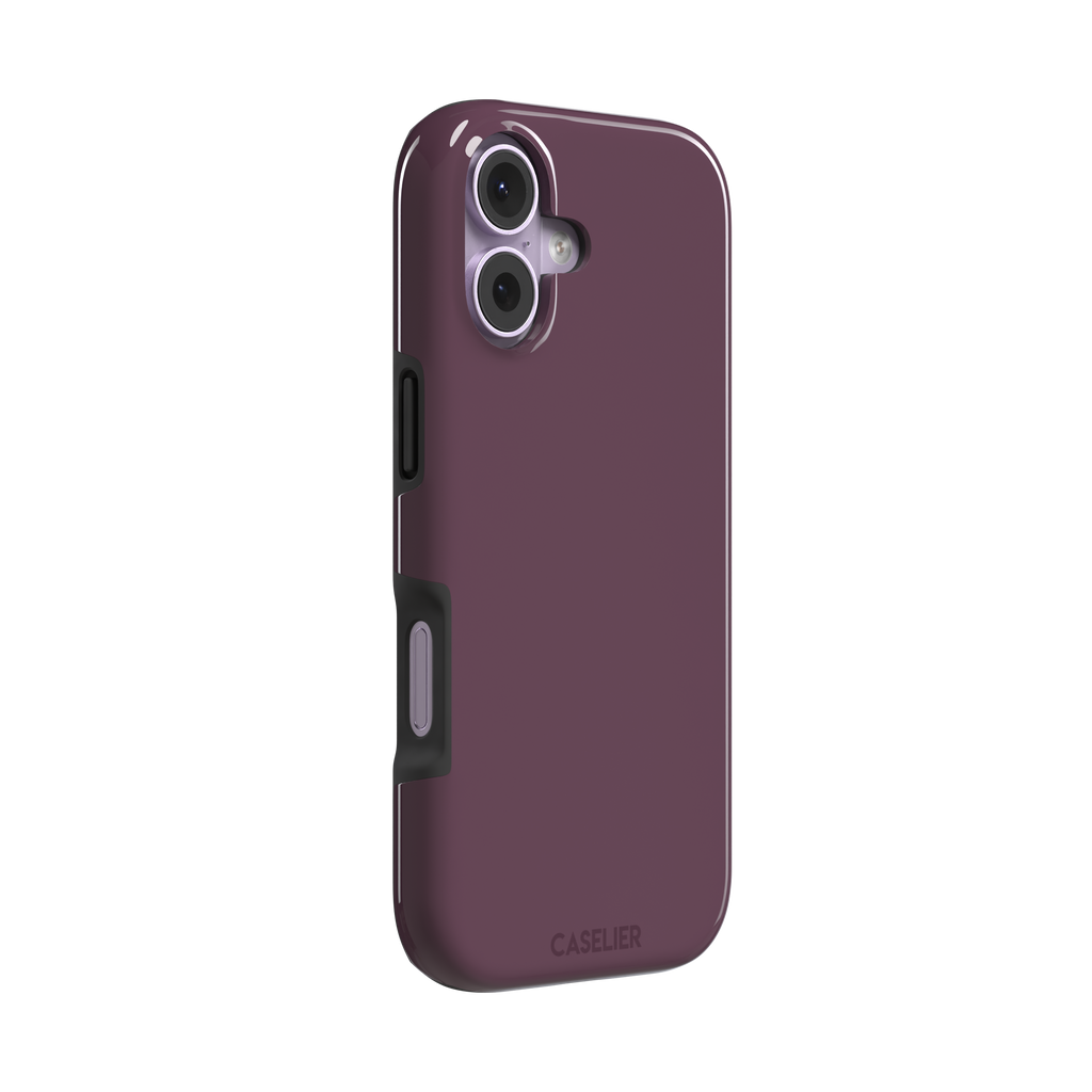 Solid burgundy-purple phone case in a muted, wine-toned purple, phone case by Caselier — tough case, left view