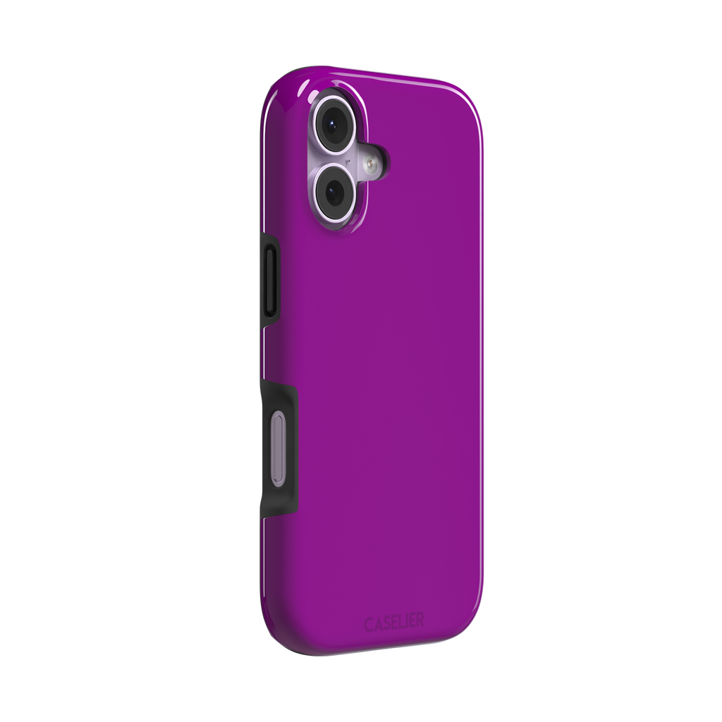 Solid magenta-purple phone case in a vivid, warm fuchsia-purple tone, phone case by Caselier — tough case, left view