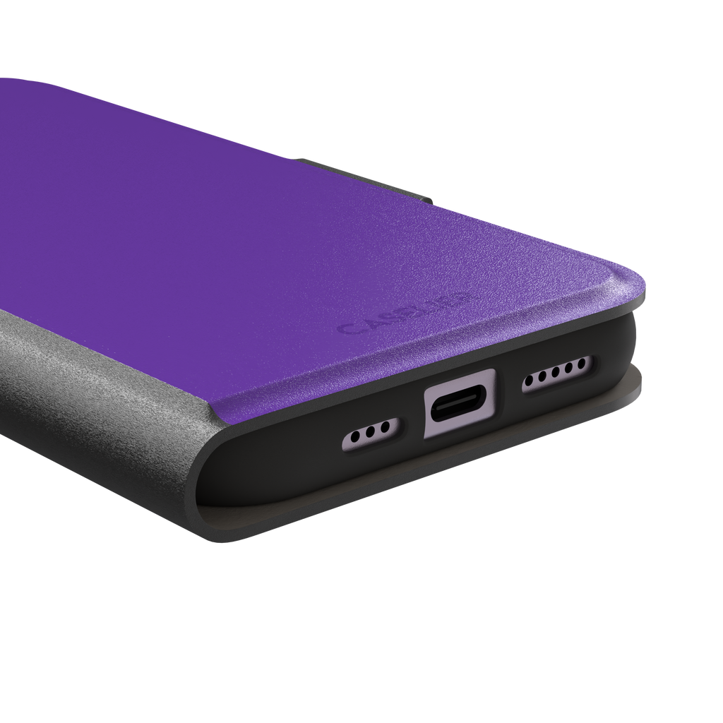 Solid bright violet phone case in a vivid, saturated purple tone, phone case by Caselier — wallet case, charging port detail