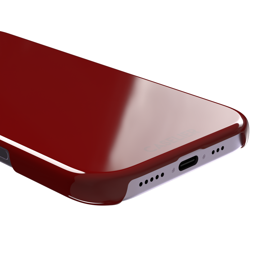 Solid deep brick red matte phone case color variant, phone case by Caselier — snap case, charging port detail