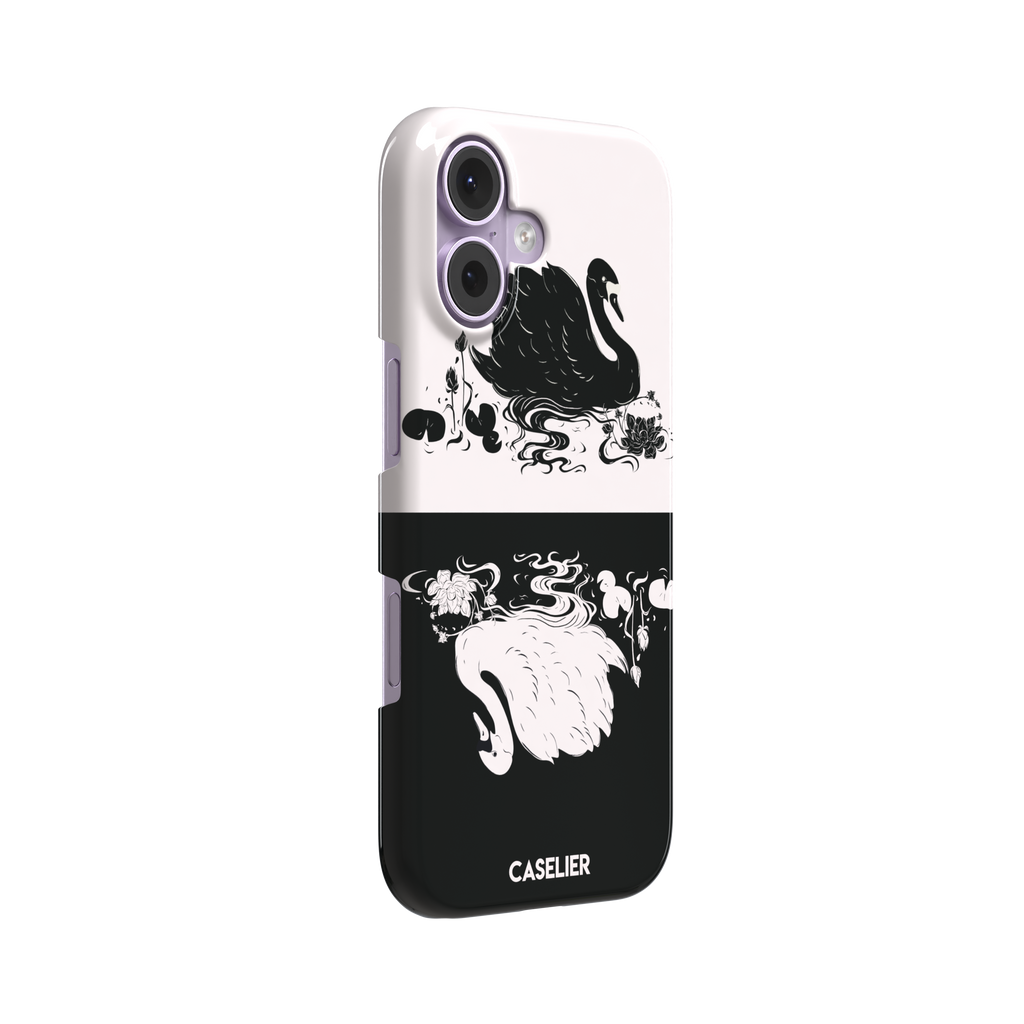 Reflection phone case in inverted colorway with a black swan on a cream upper half and a white swan on a deep black lower half, with matching lotus and water motifs — snap case, left view