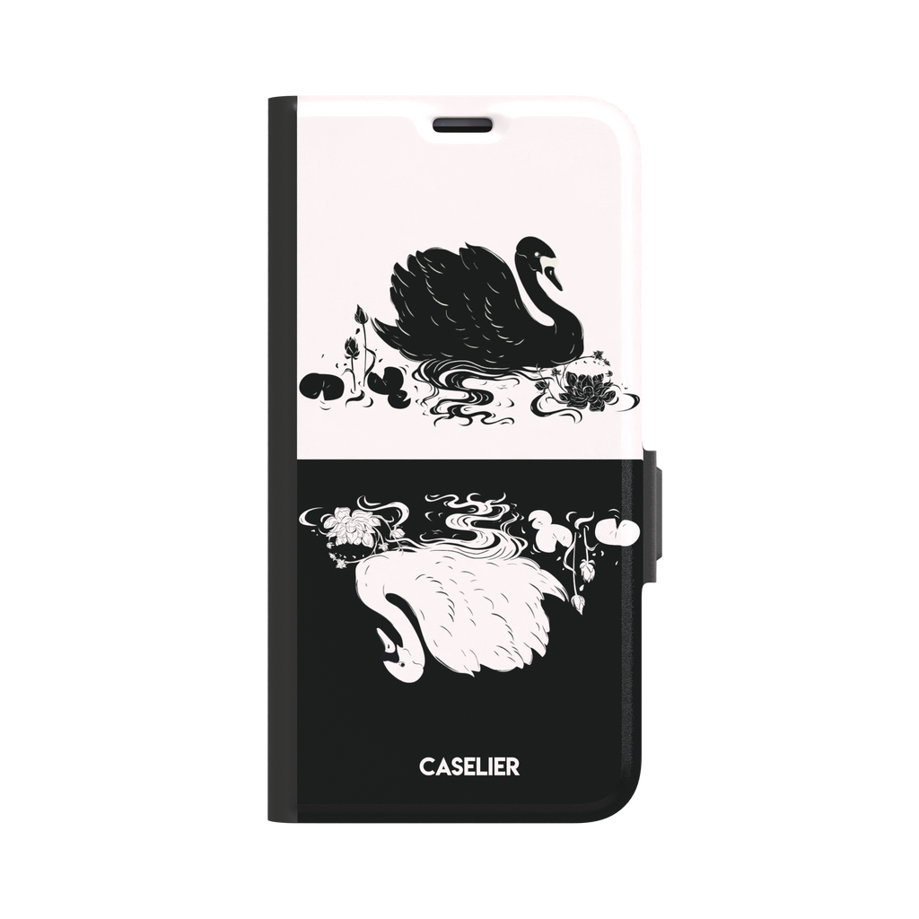 Reflection phone case in inverted colorway with a black swan on a cream upper half and a white swan on a deep black lower half, with matching lotus and water motifs — wallet case, front view