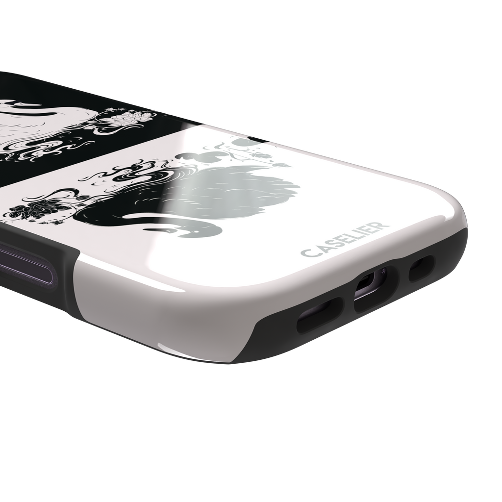 Reflection phone case showing a white swan on a black upper half mirrored by a black swan on a cream lower half, surrounded by lotus flowers and swirling water in ink illustration style — tough case, charging port detail