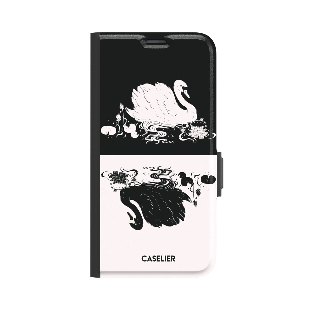 Reflection phone case showing a white swan on a black upper half mirrored by a black swan on a cream lower half, surrounded by lotus flowers and swirling water in ink illustration style — wallet case, front view