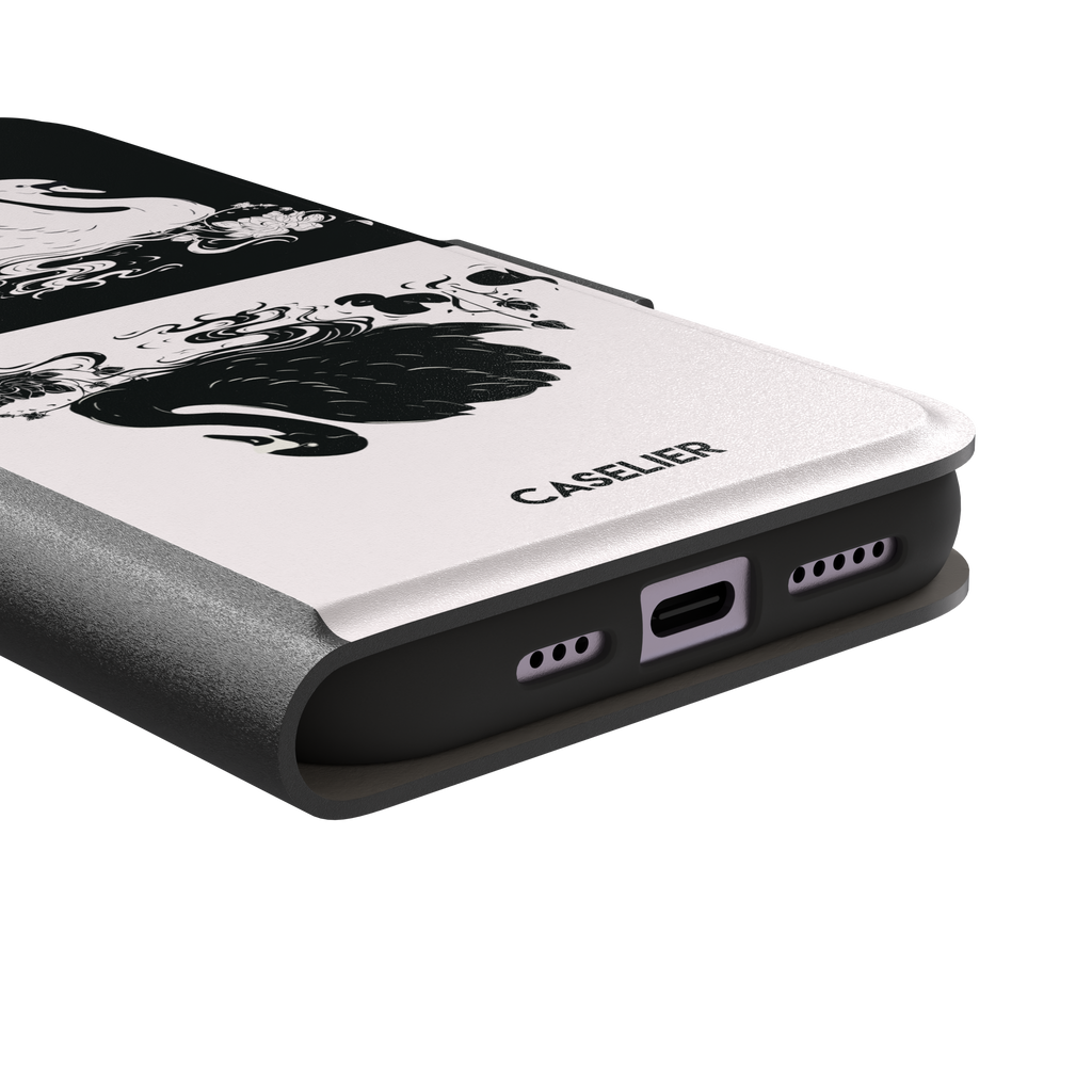 Reflection phone case showing a white swan on a black upper half mirrored by a black swan on a cream lower half, surrounded by lotus flowers and swirling water in ink illustration style — wallet case, charging port detail