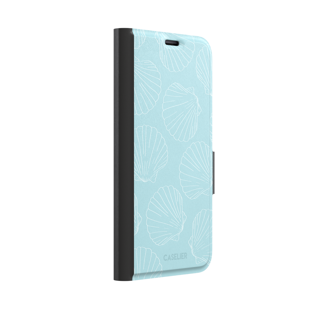 Mint blue phone case with white line-art scallop shells scattered in an all-over pattern, front view, phone case by Caselier — wallet case, left view