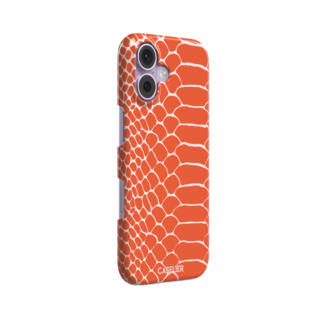 Coral orange and white snakeskin print phone case with crisp off-white scale outlines on a bold orange background, phone case by Caselier — snap case, left view