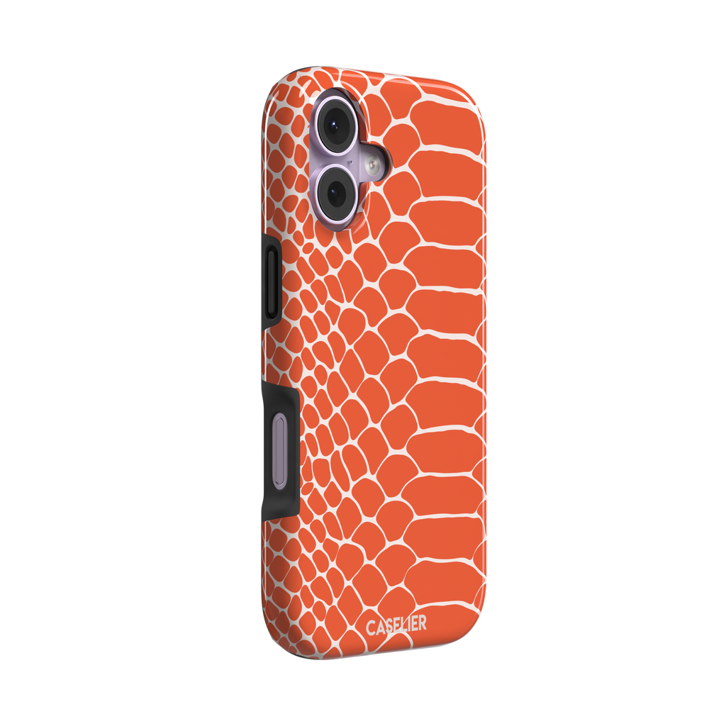Coral orange and white snakeskin print phone case with crisp off-white scale outlines on a bold orange background, phone case by Caselier — tough case, left view
