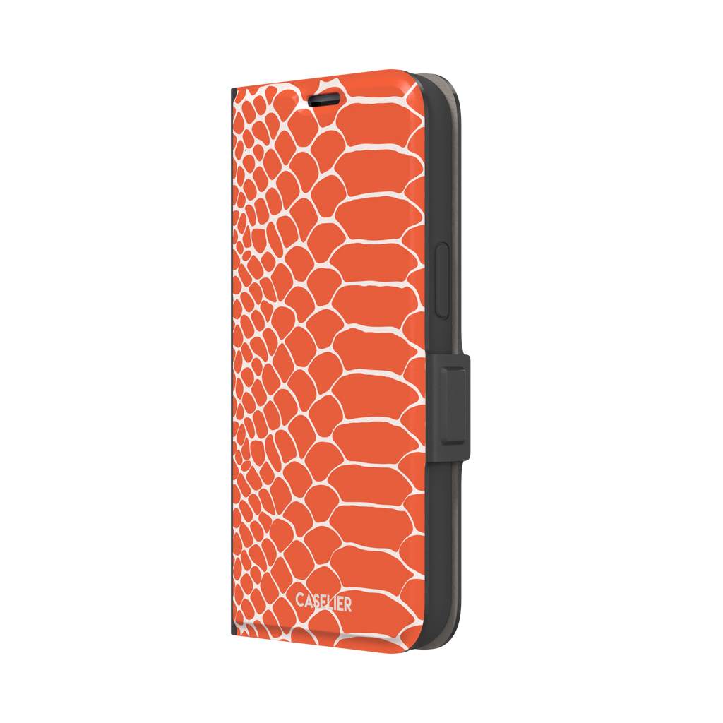 Coral orange and white snakeskin print phone case with crisp off-white scale outlines on a bold orange background, phone case by Caselier — wallet case, right view