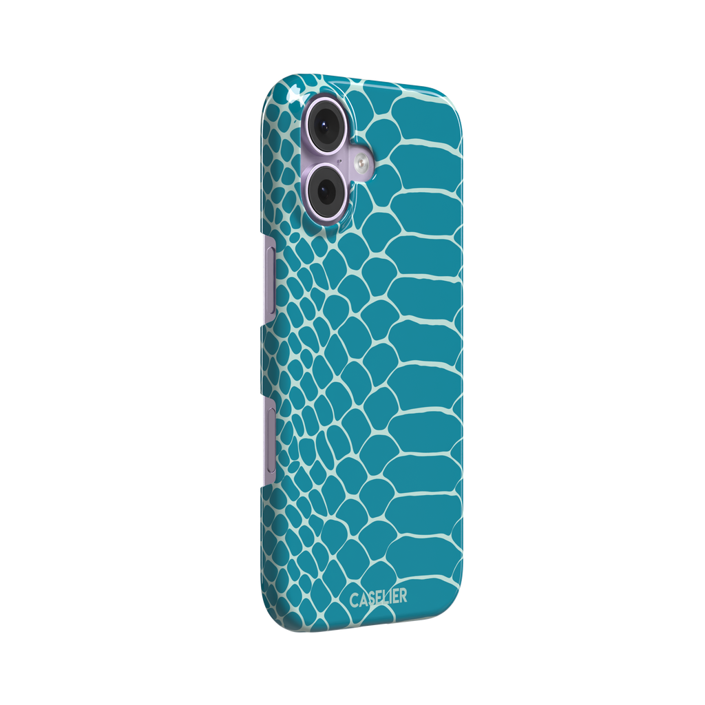 Teal and white snakeskin print phone case with bold reptile scale pattern covering the full back, phone case by Caselier — snap case, left view