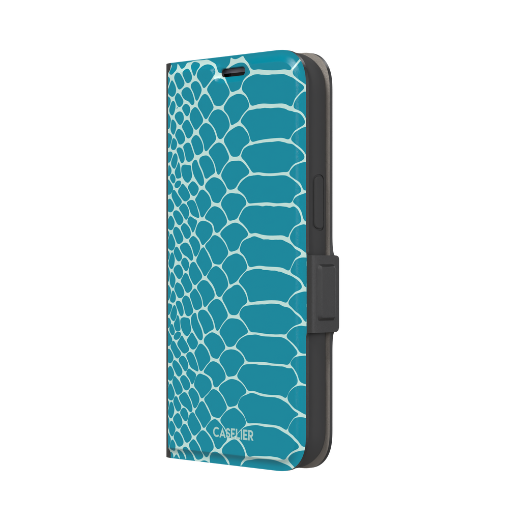 Teal and white snakeskin print phone case with bold reptile scale pattern covering the full back, phone case by Caselier — wallet case, right view