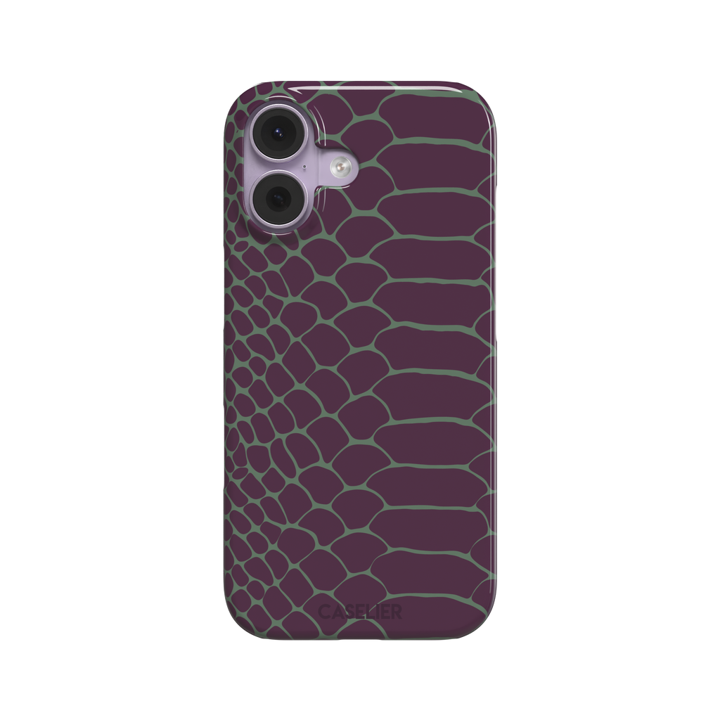 Deep plum and sage green snakeskin print phone case with muted green scale outlines on a rich purple base, phone case by Caselier — snap case, front view