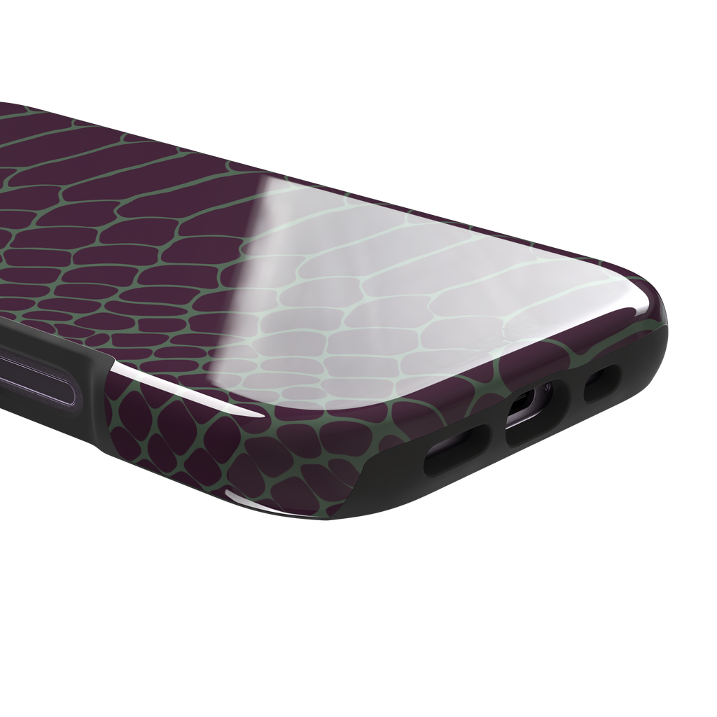 Deep plum and sage green snakeskin print phone case with muted green scale outlines on a rich purple base, phone case by Caselier — tough case, charging port detail