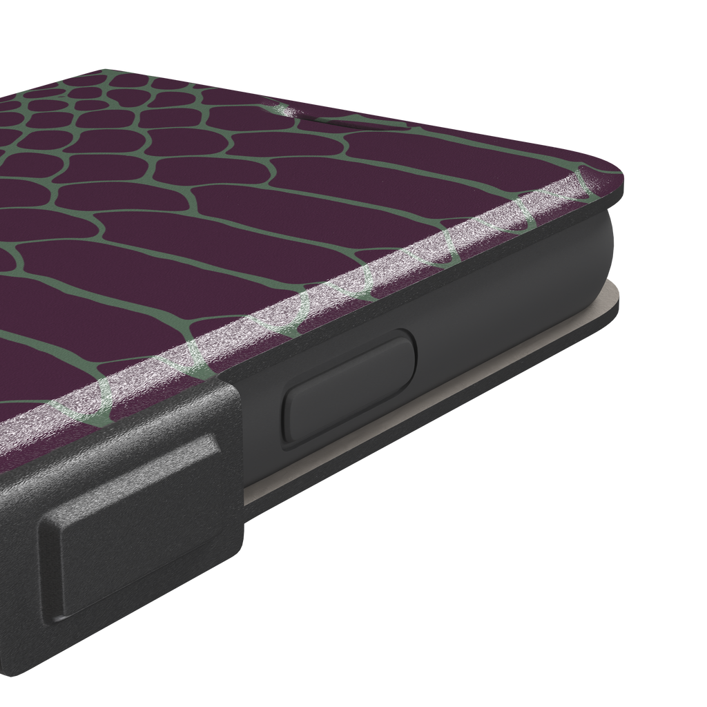 Deep plum and sage green snakeskin print phone case with muted green scale outlines on a rich purple base, phone case by Caselier — wallet case, volume buttons detail