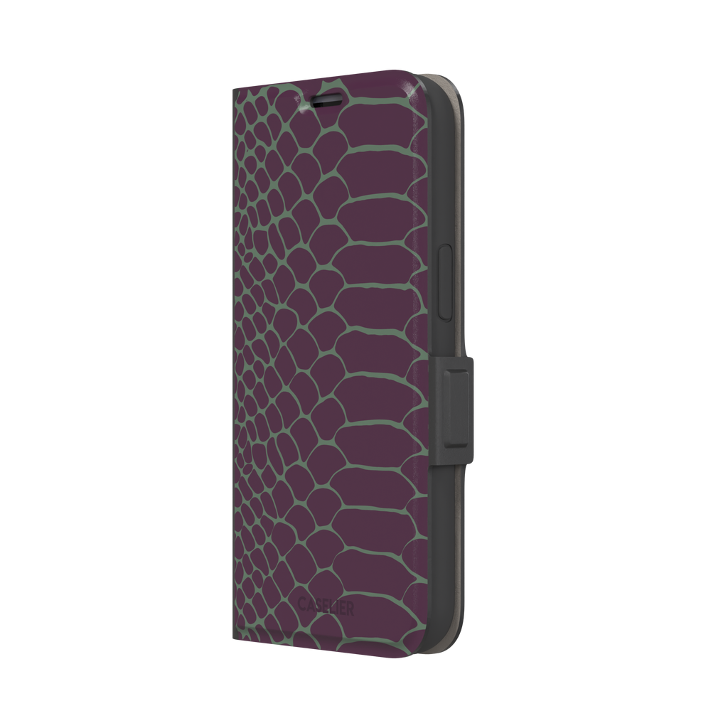 Deep plum and sage green snakeskin print phone case with muted green scale outlines on a rich purple base, phone case by Caselier — wallet case, right view