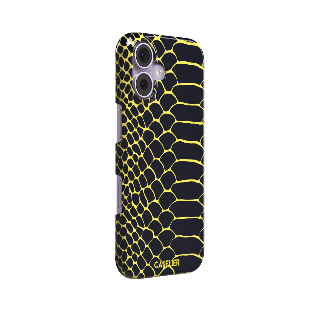 Navy and yellow snakeskin print phone case with vivid yellow scale outlines on a deep dark blue background, phone case by Caselier — snap case, left view