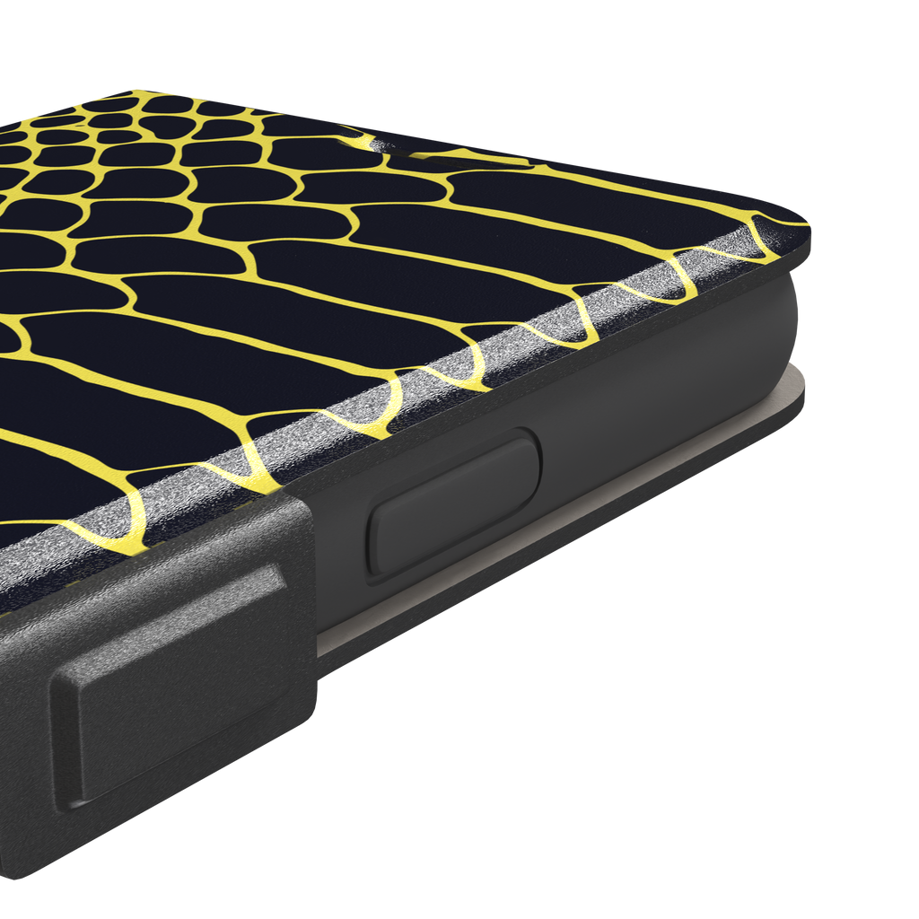 Navy and yellow snakeskin print phone case with vivid yellow scale outlines on a deep dark blue background, phone case by Caselier — wallet case, volume buttons detail