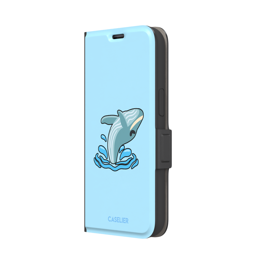 Sky-blue phone case featuring a cute cartoon humpback whale breaching from splashing waves, rendered in teal and cream with bold outlines, phone case by Caselier — wallet case, right view