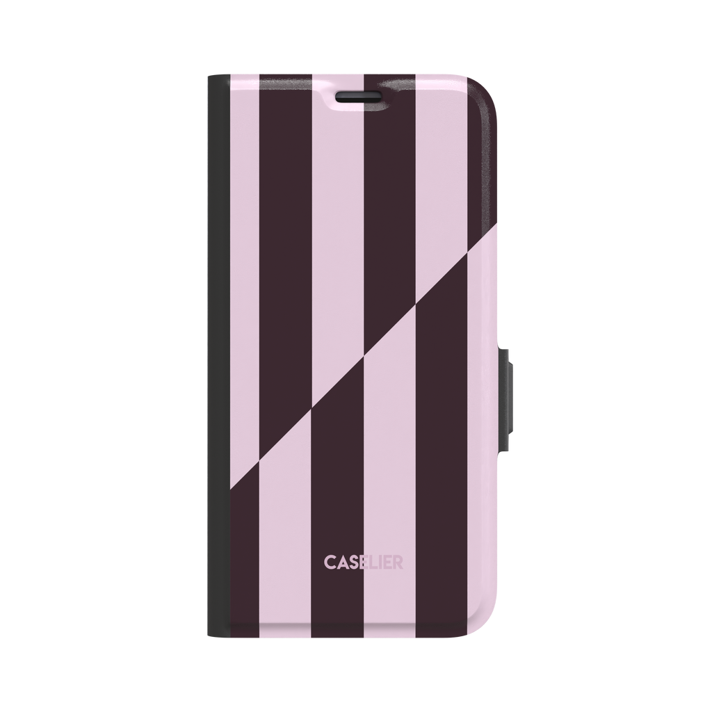 Split Stripes folio wallet phone case in deep plum and pale pink vertical stripes with diagonal split, front-facing view showing black spine and side clasp, white background, phone case by Caselier - wallet case, front view | Caselier