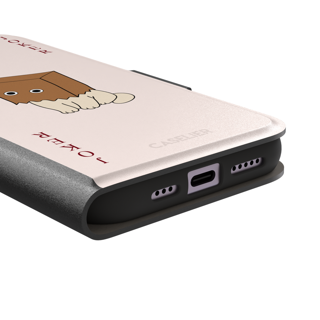 Spooky Joker phone case in blush pink showing a cartoon cat with a brown paper bag over its head styled as a joker playing card, phone case by Caselier — wallet case, charging port detail