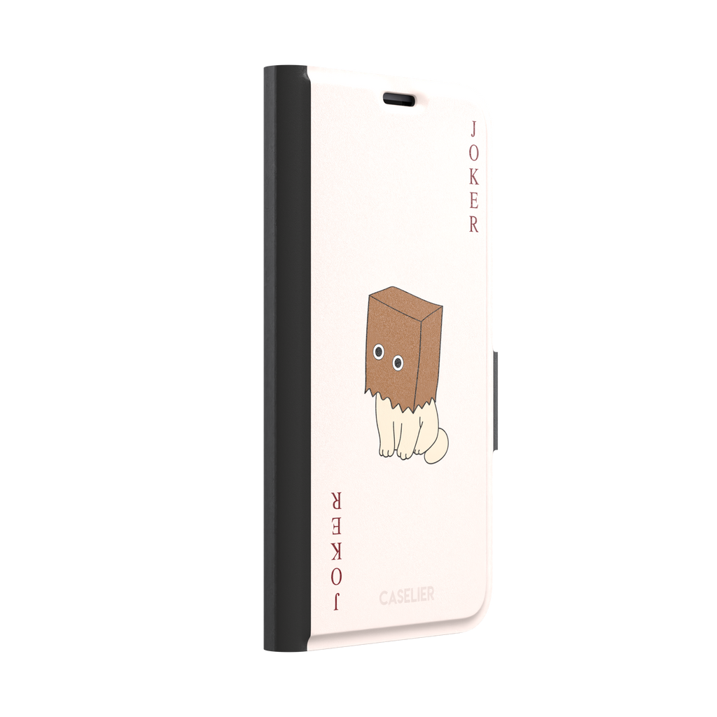 Spooky Joker phone case in blush pink showing a cartoon cat with a brown paper bag over its head styled as a joker playing card, phone case by Caselier — wallet case, left view