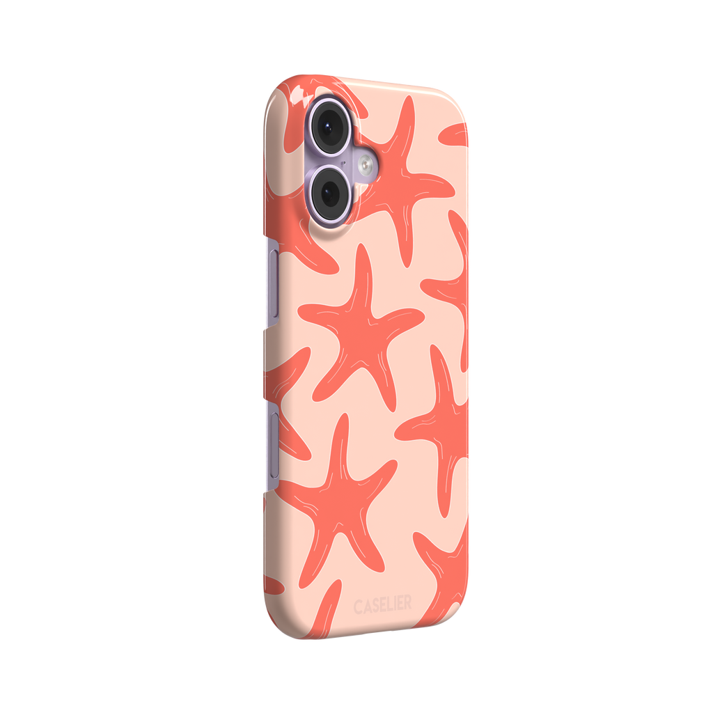 Starfish phone case with bold coral starfish pattern on a soft peach background, part of the Memories of Summer collection, phone case by Caselier — snap case, left view