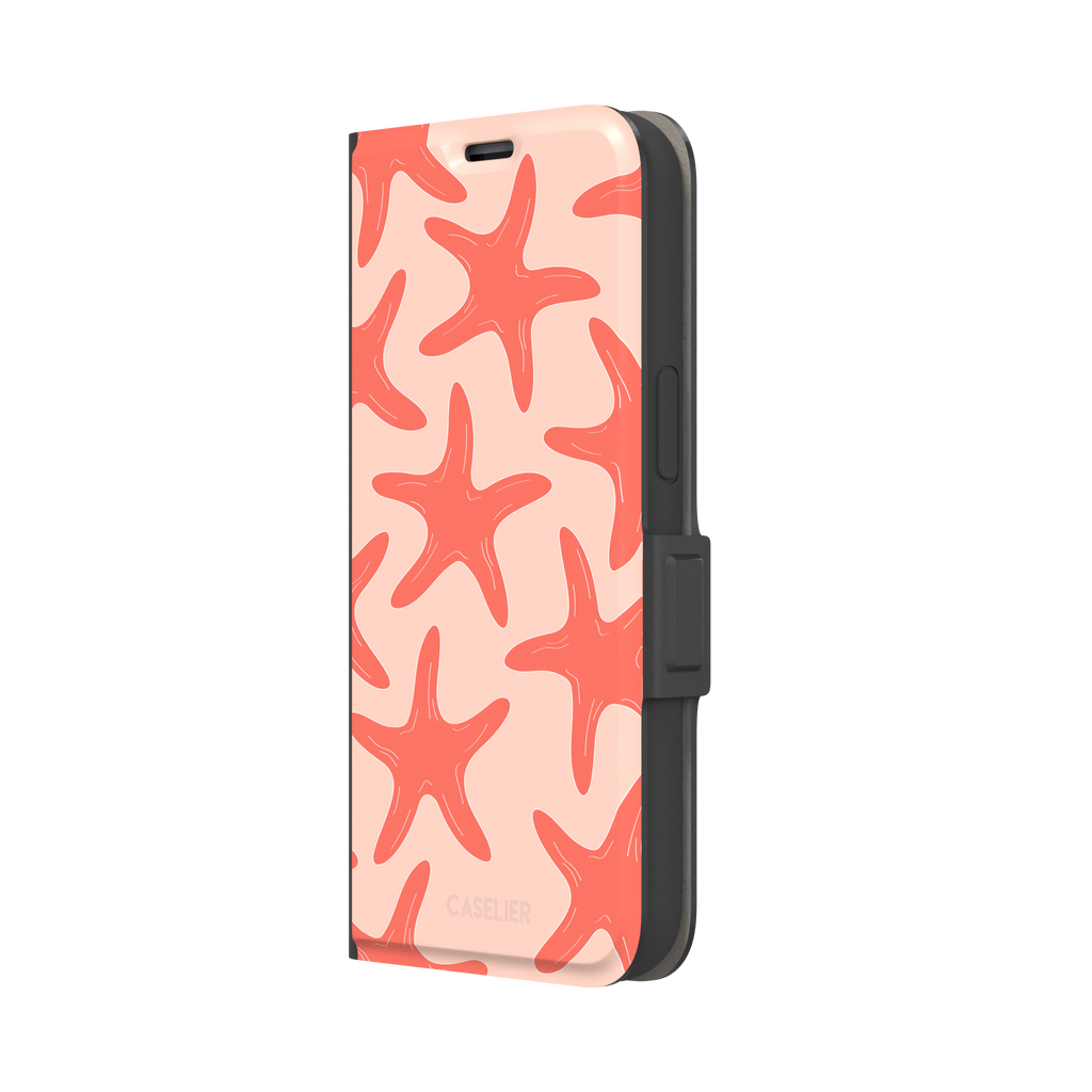 Starfish phone case with bold coral starfish pattern on a soft peach background, part of the Memories of Summer collection, phone case by Caselier — wallet case, right view
