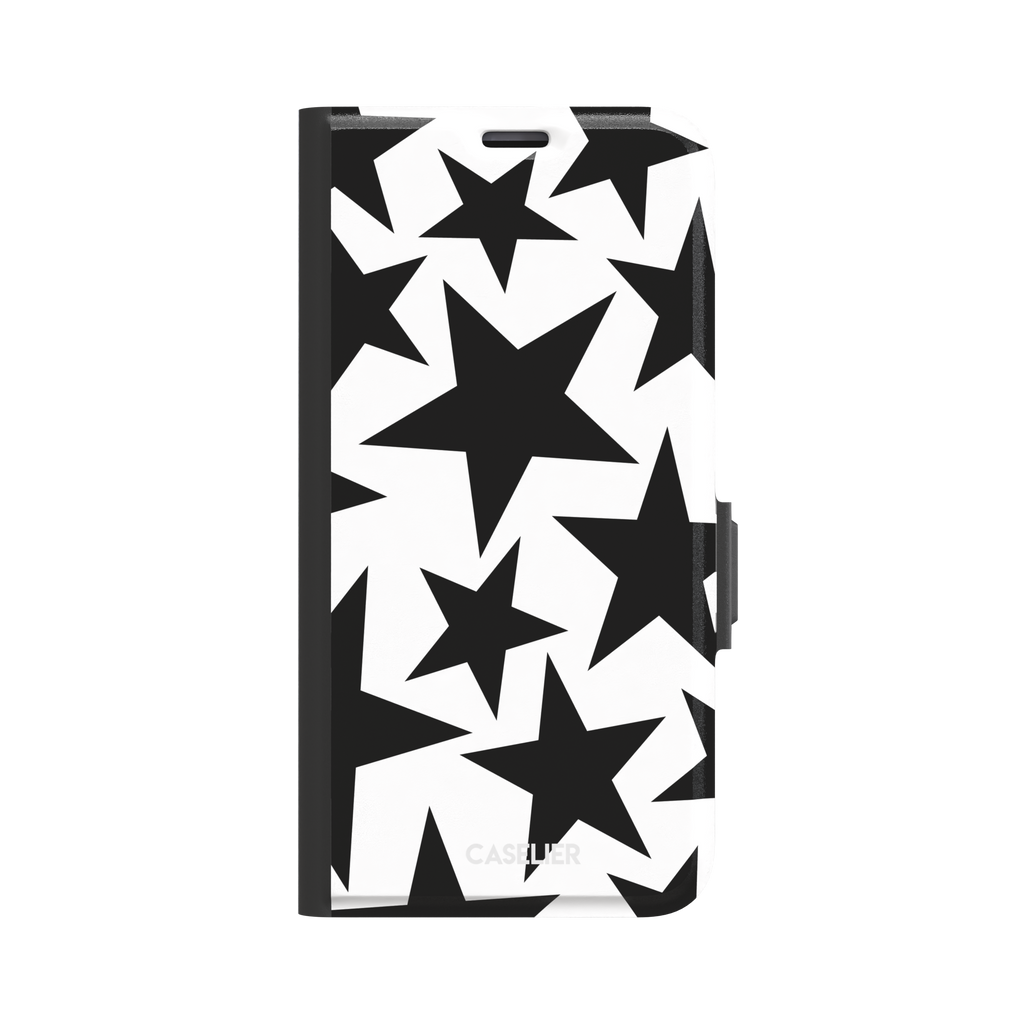 Stars phone case variant in bold black and white with large graphic scattered star pattern, phone case by Caselier — wallet case, front view