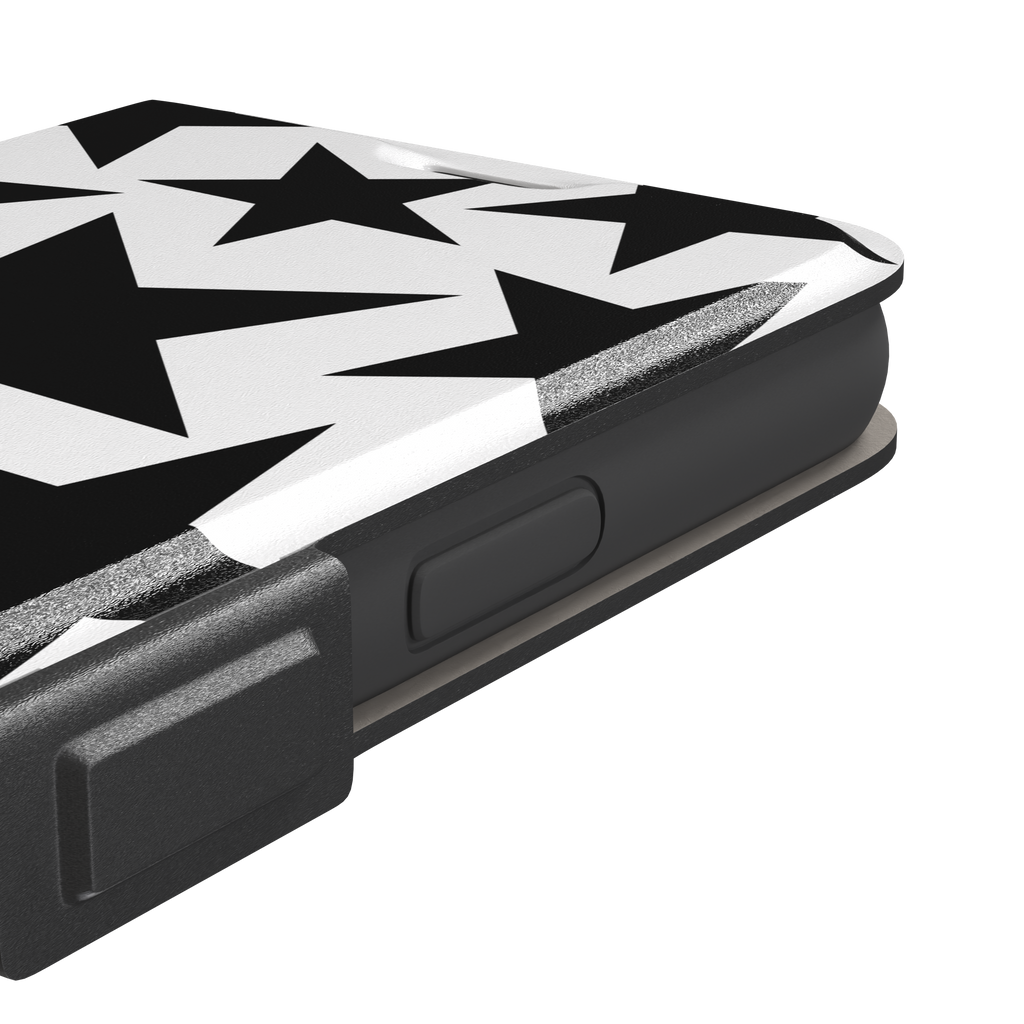 Stars phone case variant in bold black and white with large graphic scattered star pattern, phone case by Caselier — wallet case, volume buttons detail